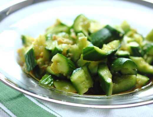 This is a popular home-style dish from Dongbei (东北), the Northeastern region of China. Smashing the cucumbers makes it easier for them to absorb salad dressing and creates a more interesting and varied texture.