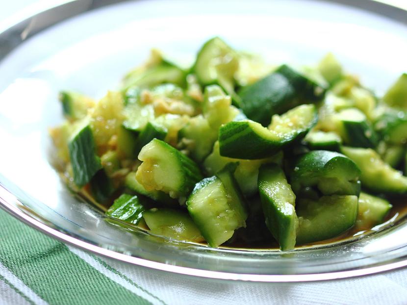 This is a popular home-style dish from Dongbei (东北), the Northeastern region of China. Smashing the cucumbers makes it easier for them to absorb salad dressing and creates a more interesting and varied texture.