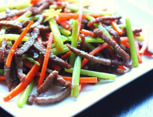 In this Sichuan dish, the dry-frying method creates a slightly chewy and crisp texture in the beef, which works nicely with crisp Chinese celery and carrots.