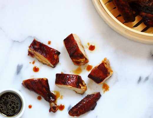 Dark soy sauce, light soy sauce, Shaoxing wine, and sesame oil make the steamed chicken aromatic, flavorful, and richly colored.