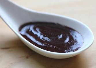 Tian mian jiang (甜面酱), meaning “sweet flour paste” in Mandarin, is a dark brown fermented paste made primarily from wheat flour, water, and salt.  Also known as sweet bean paste, it’s a key ingredient in the cuisines of Beijing and northern China.