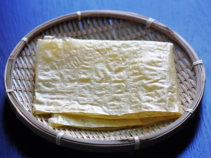 Tofu skin, known as doufu pi (豆腐皮) in China and yuba in Japan.
