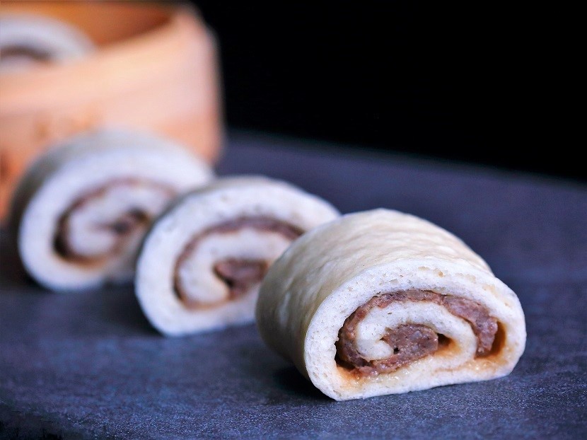 These steamed meat-filled rolls, called lazy dragon, are a favorite street food in Beijing. Creating these fluffy, juicy lazy dragon rolls at home is quite easy, even if you've never made Chinese buns or dumplings before.