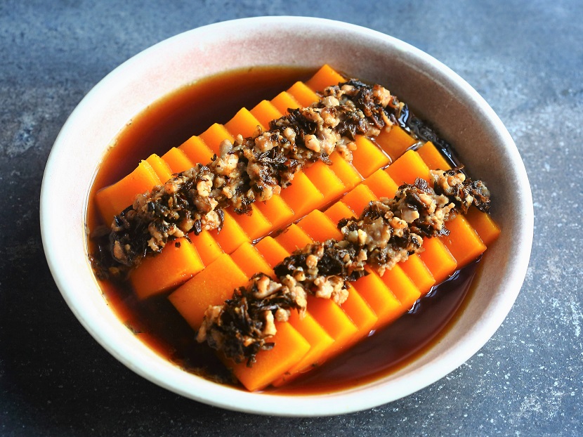 In this dish, meigan cai lends layers of flavor to the sweet butternut squash