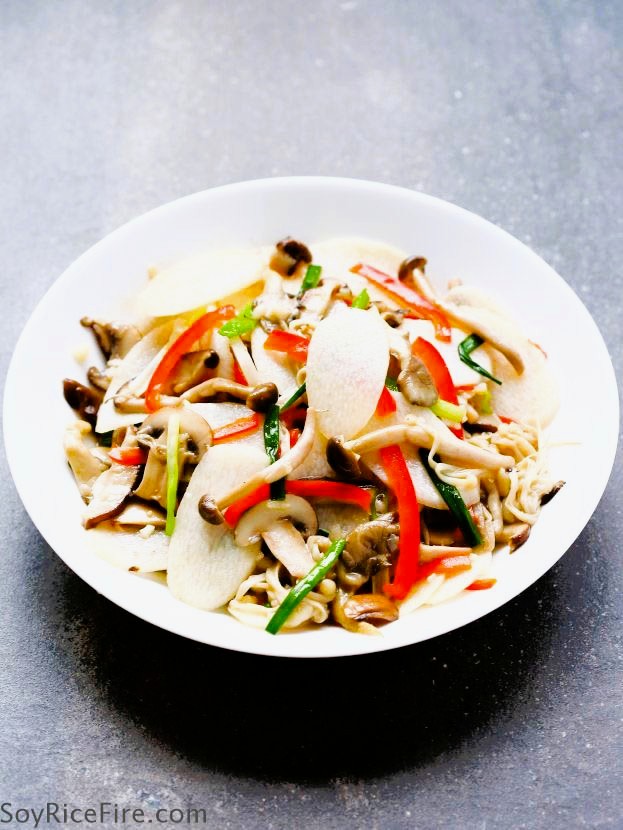 When thin slices of yam are blanched briefly and then tossed with the mushrooms, they retain their wonderful crispness and subtle sweetness.